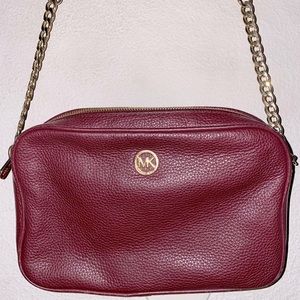 Michael Kors cross body purse Burgundy